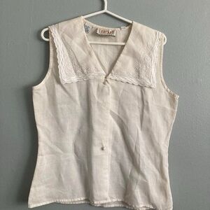 Braemar Petites 100% Linen
Cream Blouse Sleeveless
Embroidered Back Panel 10P